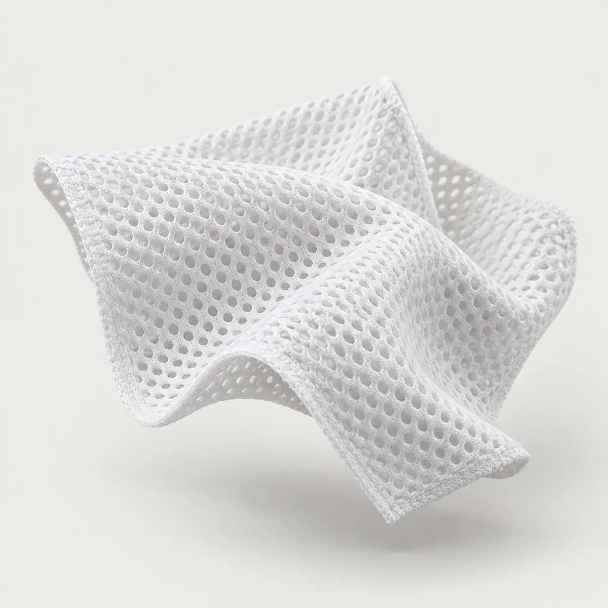 White athletic mesh fabric with open honeycomb holes